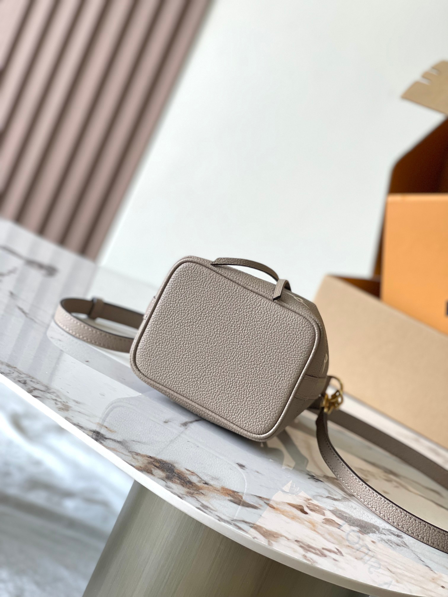 Designer Monogram Nano Noe Bicolor Monogram Empreinte Leather shoulder bag - Gorchic - $93.99