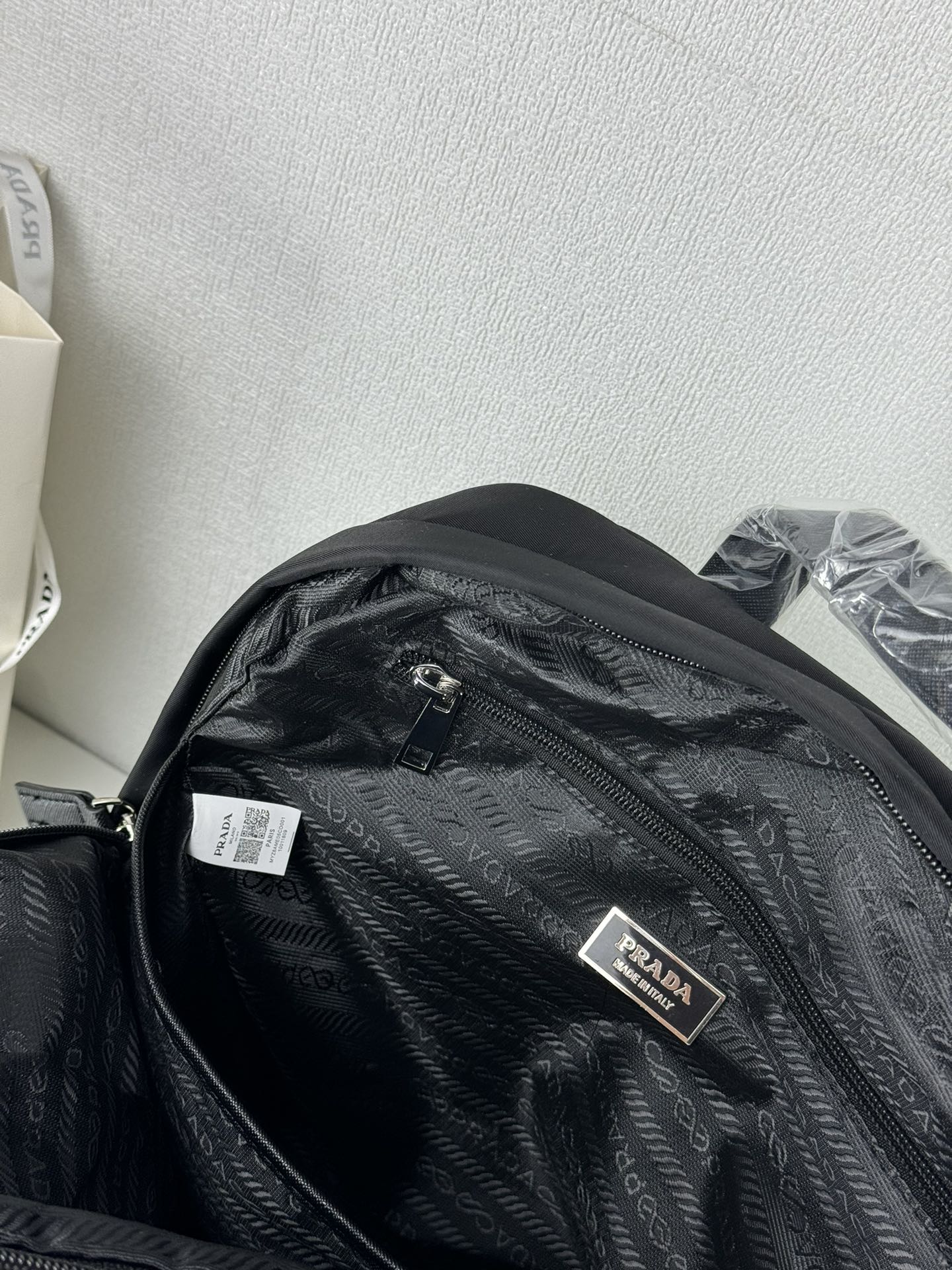 Saffiano texture triangle-logo zipped backpack Black Schoolbag - Gorchic - $132.99