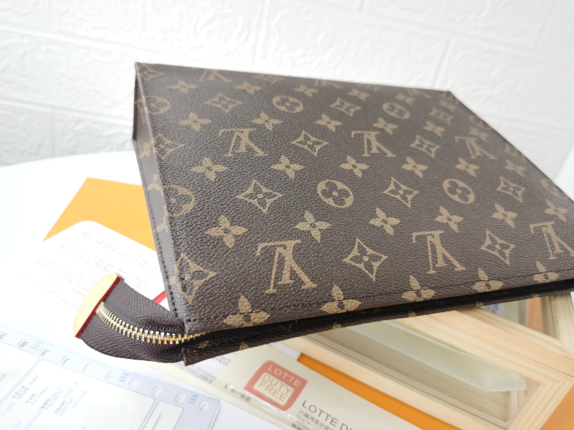 Designer Monogram Monogram Poche Toilette NM - Gorchic - $83.99