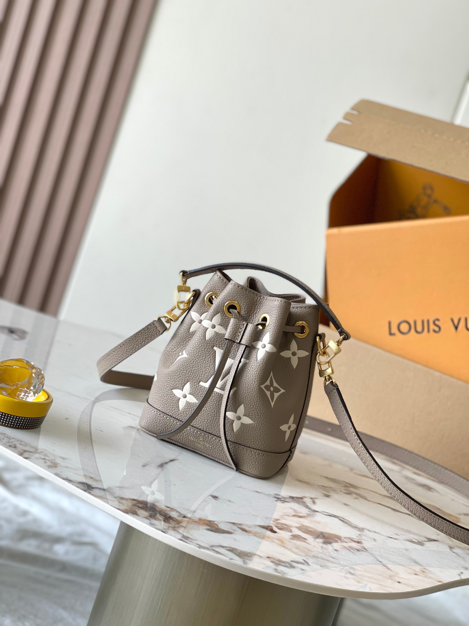 Designer Monogram Nano Noe Bicolor Monogram Empreinte Leather shoulder bag - Gorchic - $93.99