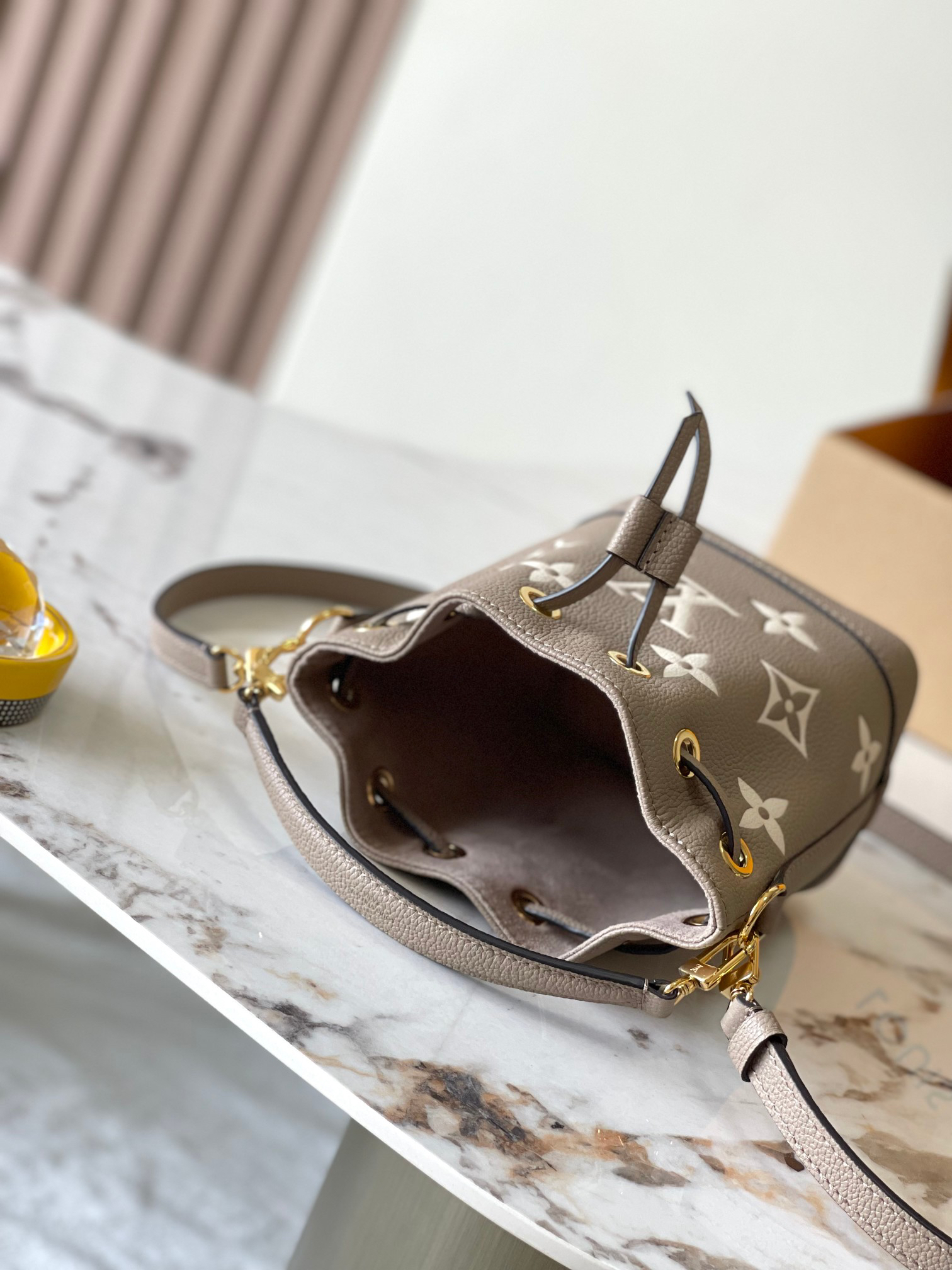 Designer Monogram Nano Noe Bicolor Monogram Empreinte Leather shoulder bag - Gorchic - $93.99