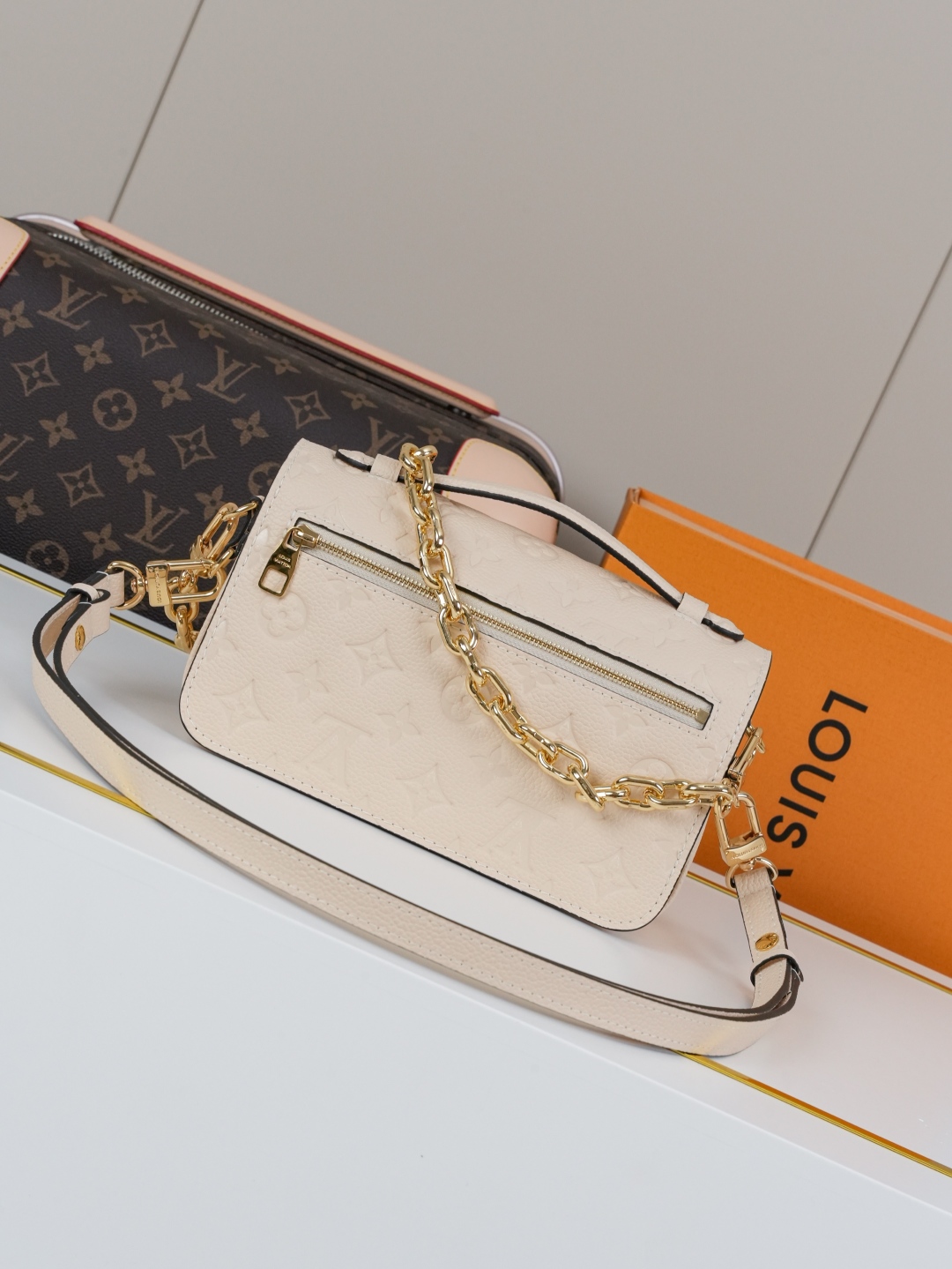 Designer Pochette Métis East West Embossed Soft Grain Cowhide - Crème Beige - Gorchic - $116.99