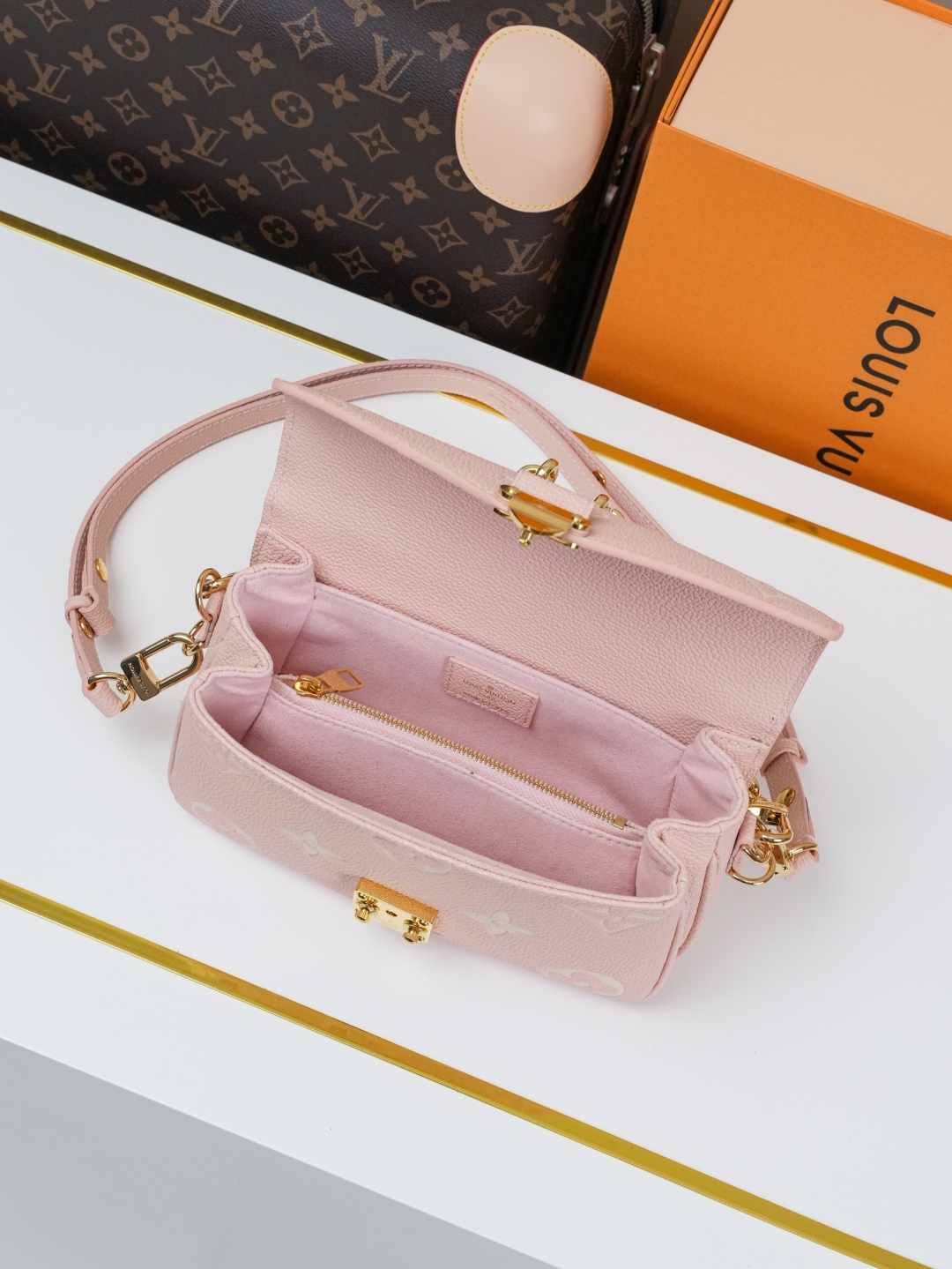 Designer Pochette Métis East West Embossed Grain Cowhide - Pink - Gorchic - $116.99