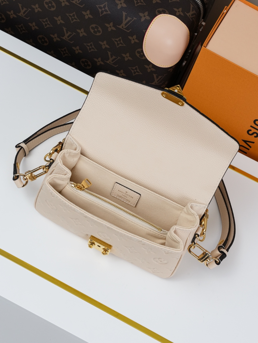 Designer Pochette Métis East West Embossed Soft Grain Cowhide - Crème Beige - Gorchic - $116.99