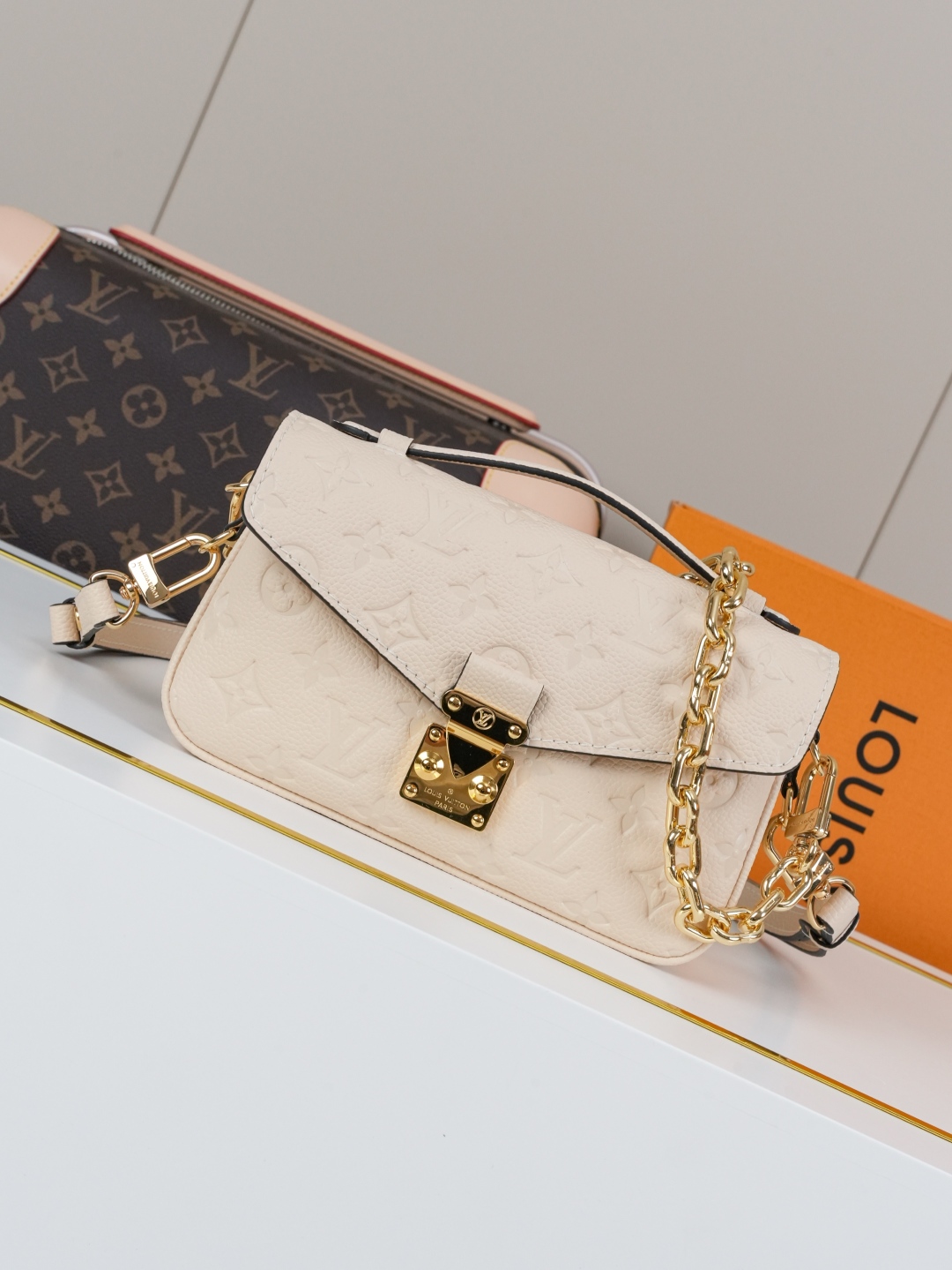 Designer Pochette Métis East West Embossed Soft Grain Cowhide - Crème Beige - Gorchic - $116.99