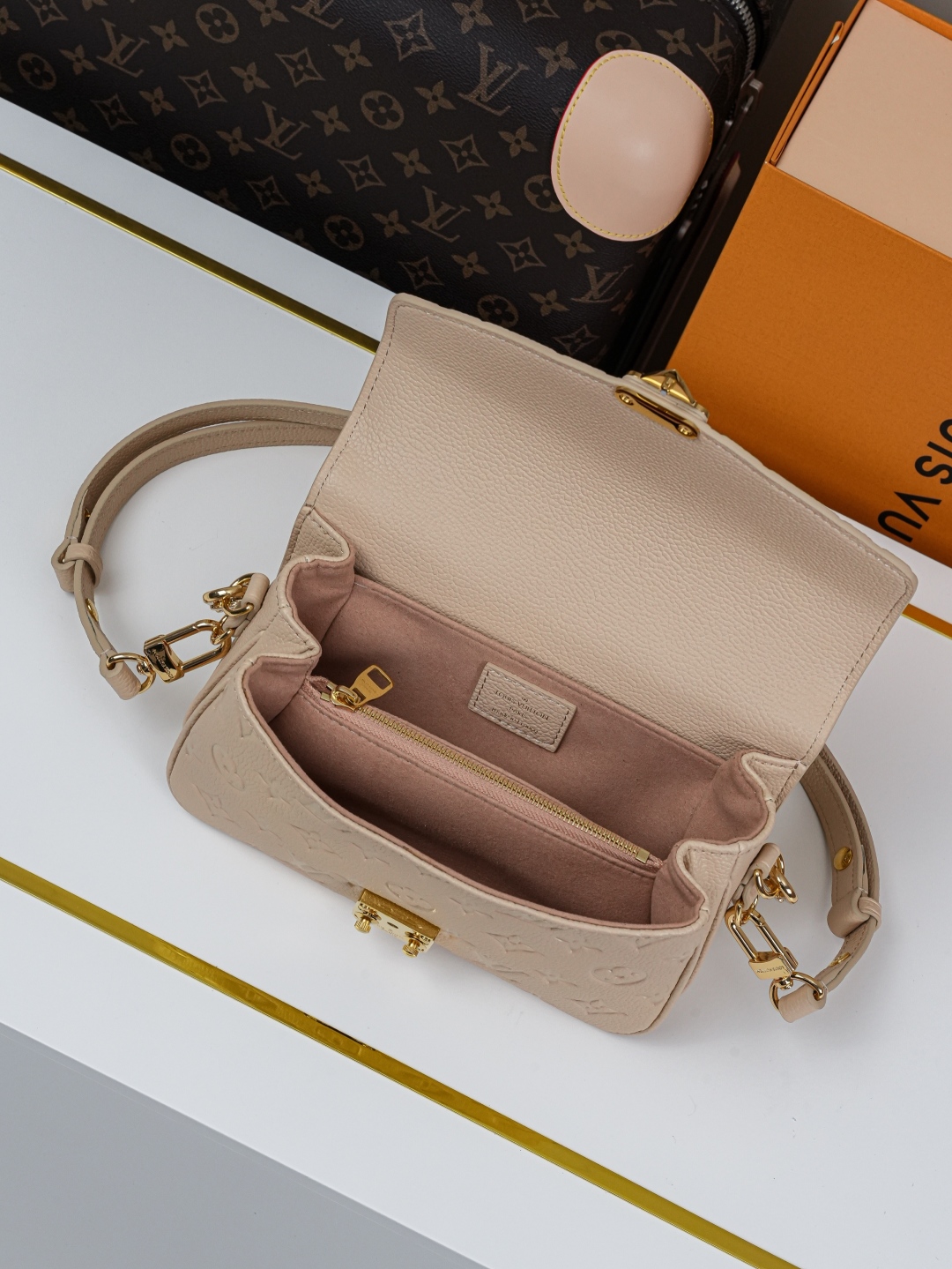 Designer Pochette Métis East West Grained Cowhide Leather - Sand - Gorchic - $116.99