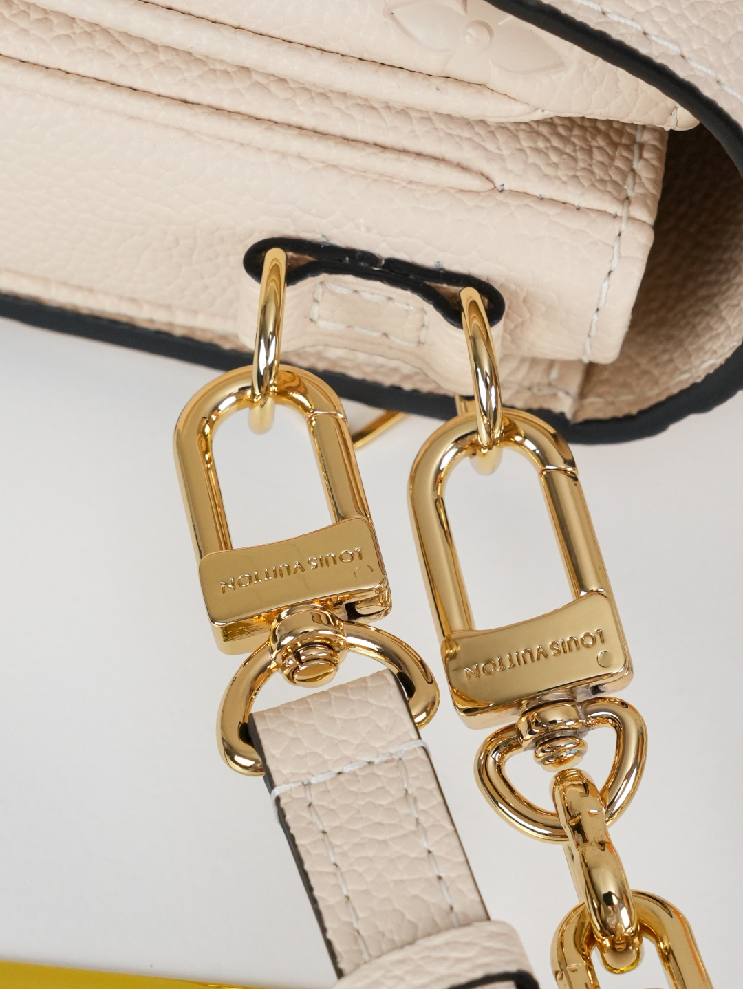 Designer Pochette Métis East West Embossed Soft Grain Cowhide - Crème Beige - Gorchic - $116.99