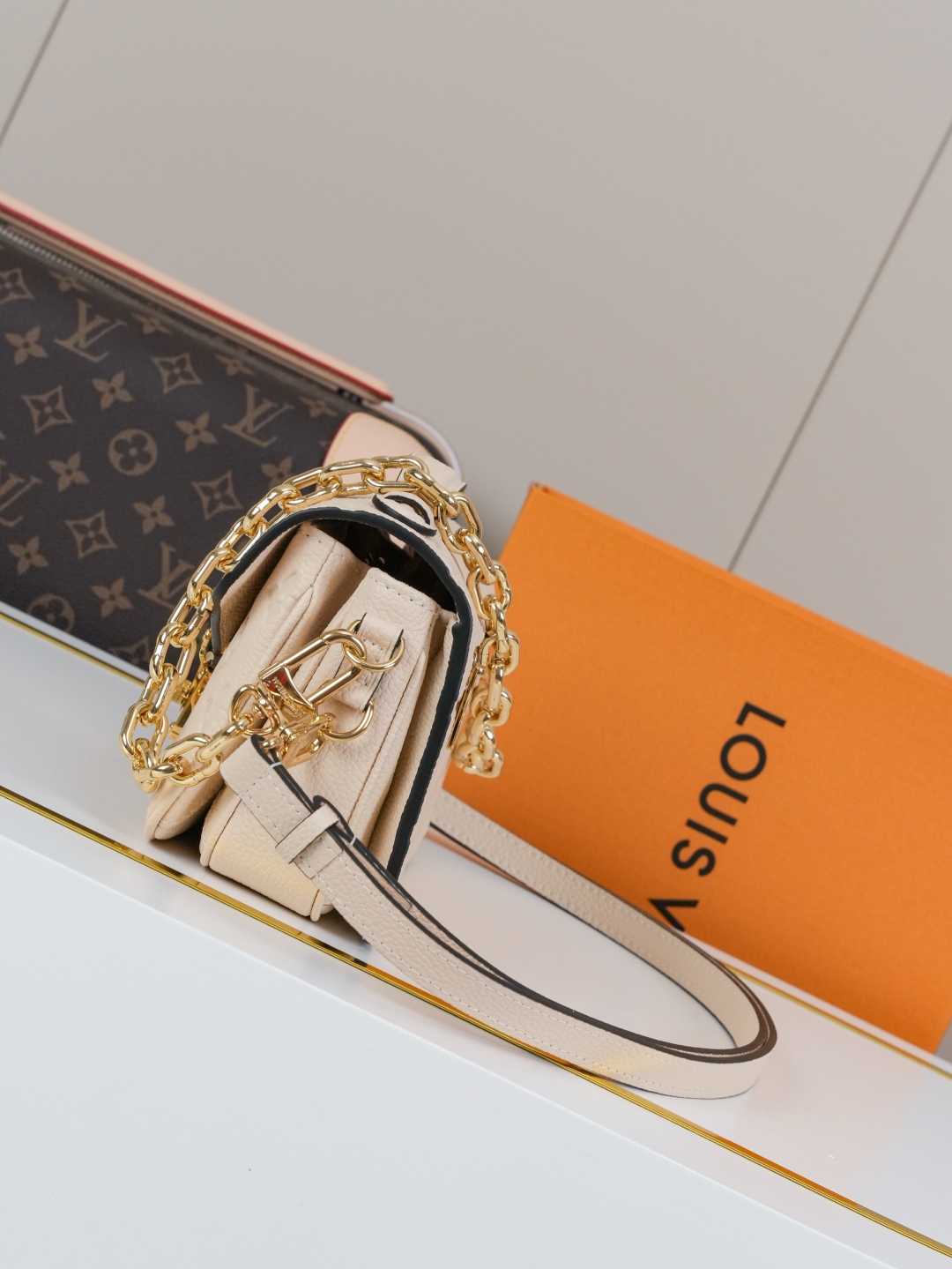 Designer Pochette Métis East West Embossed Soft Grain Cowhide - Crème Beige - Gorchic - $116.99