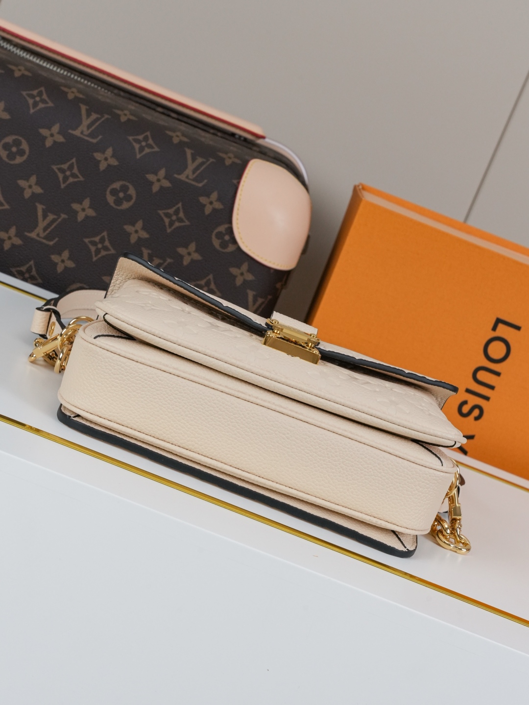 Designer Pochette Métis East West Embossed Soft Grain Cowhide - Crème Beige - Gorchic - $116.99