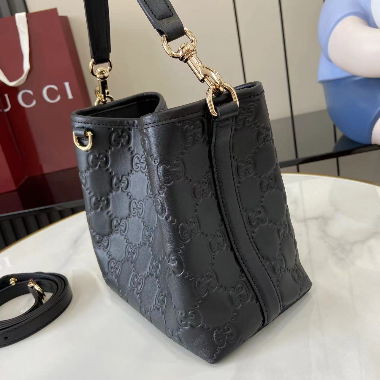 Double-G GG Emblem Small Bucket Bag GG Print Embossed Leather - Black - Gorchic - $128.99