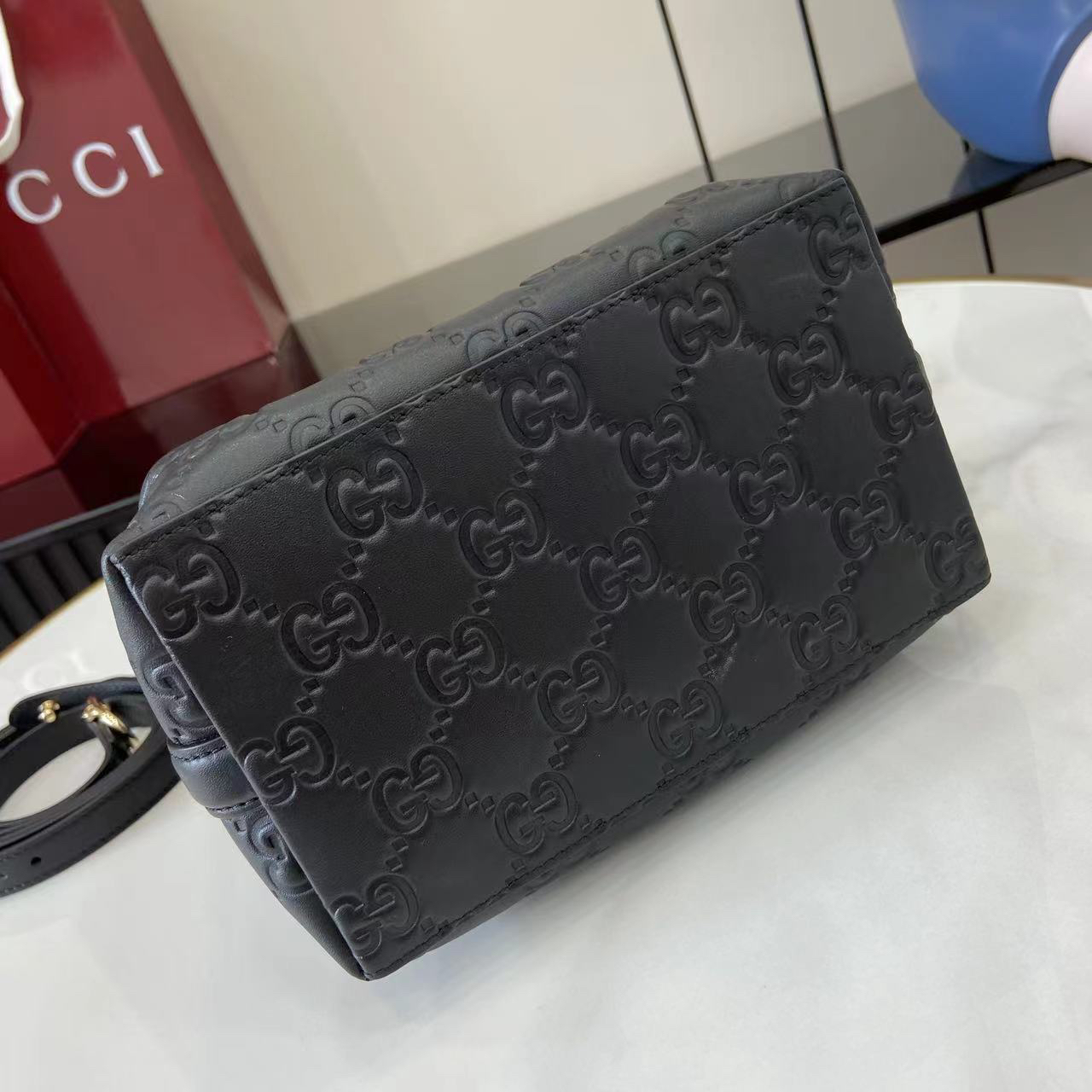 Double-G GG Emblem Small Bucket Bag GG Print Embossed Leather - Black - Gorchic - $128.99