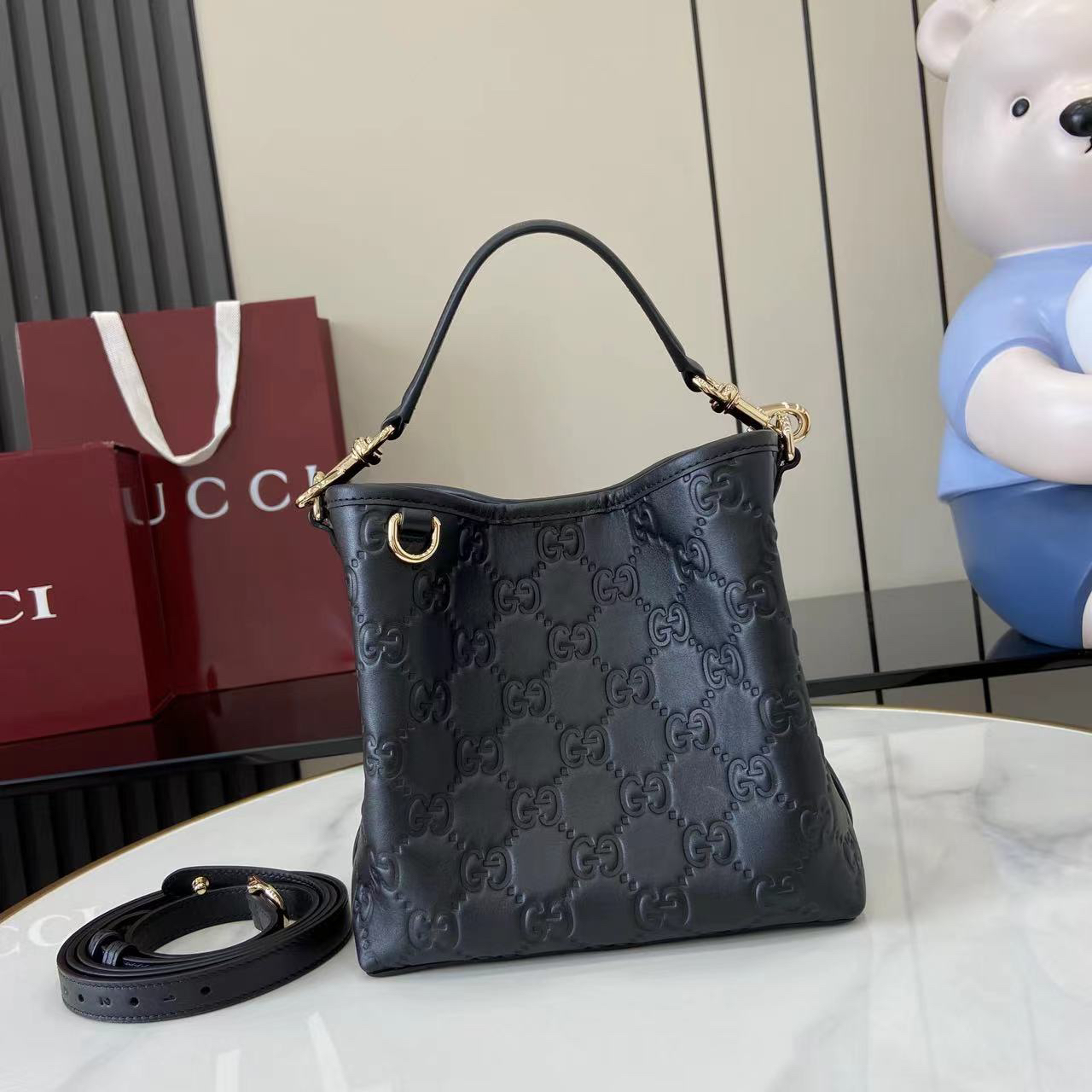 Double-G GG Emblem Small Bucket Bag GG Print Embossed Leather - Black - Gorchic - $128.99