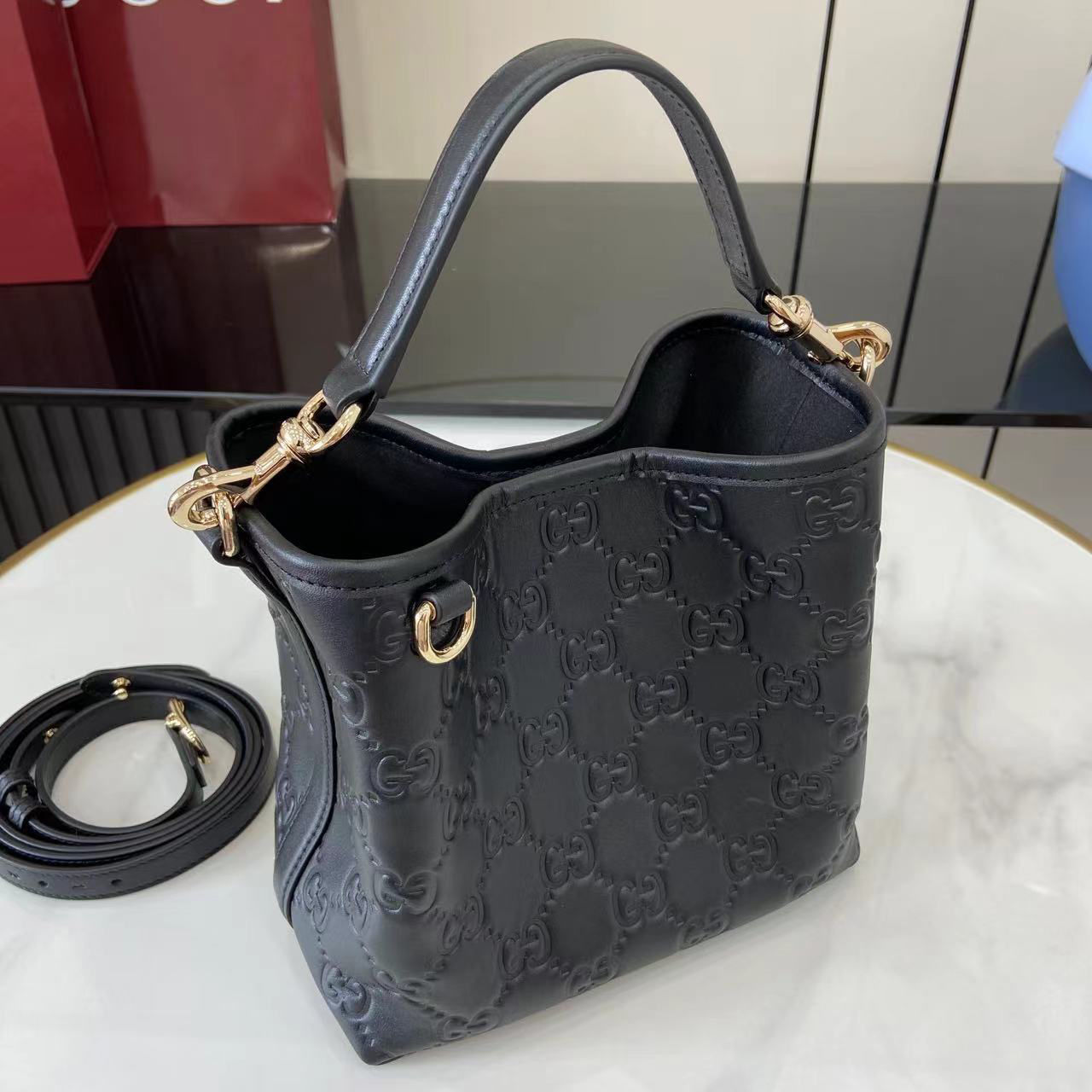 Double-G GG Emblem Small Bucket Bag GG Print Embossed Leather - Black - Gorchic - $128.99