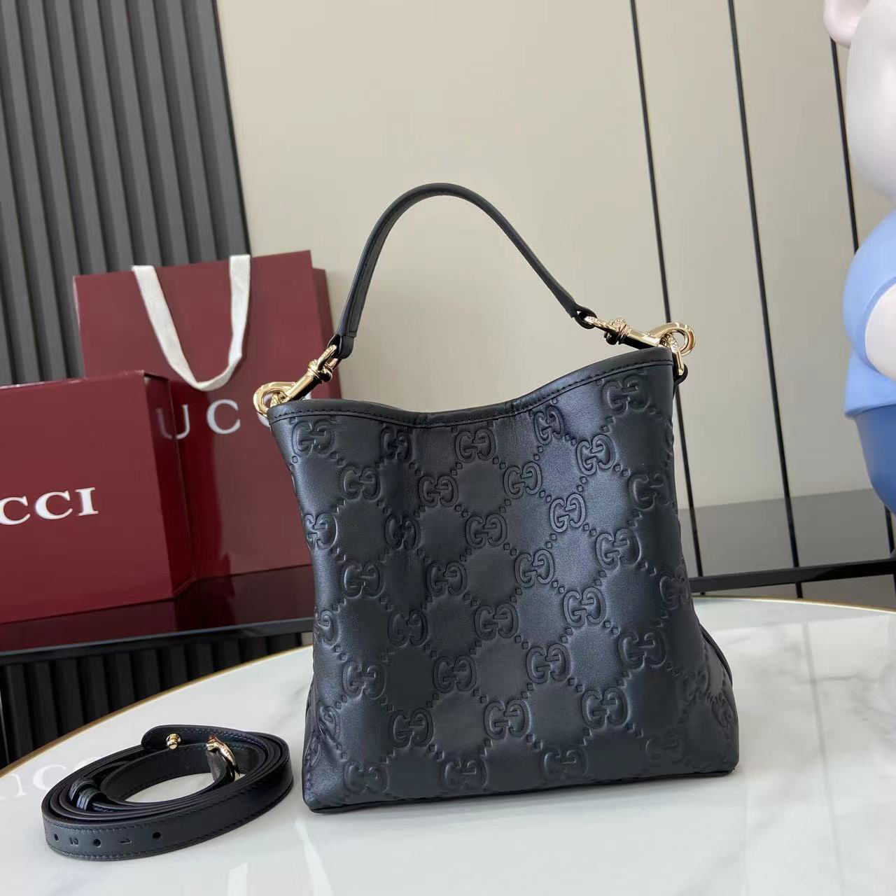 Double-G GG Emblem Small Bucket Bag GG Print Embossed Leather - Black - Gorchic - $128.99